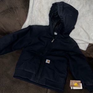 Black Carhartt size 7/8 (small) winter coat never been worn